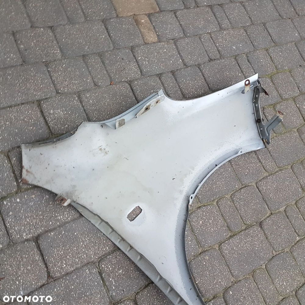 błotnik nissan micra k12 lewy oryginal - 1