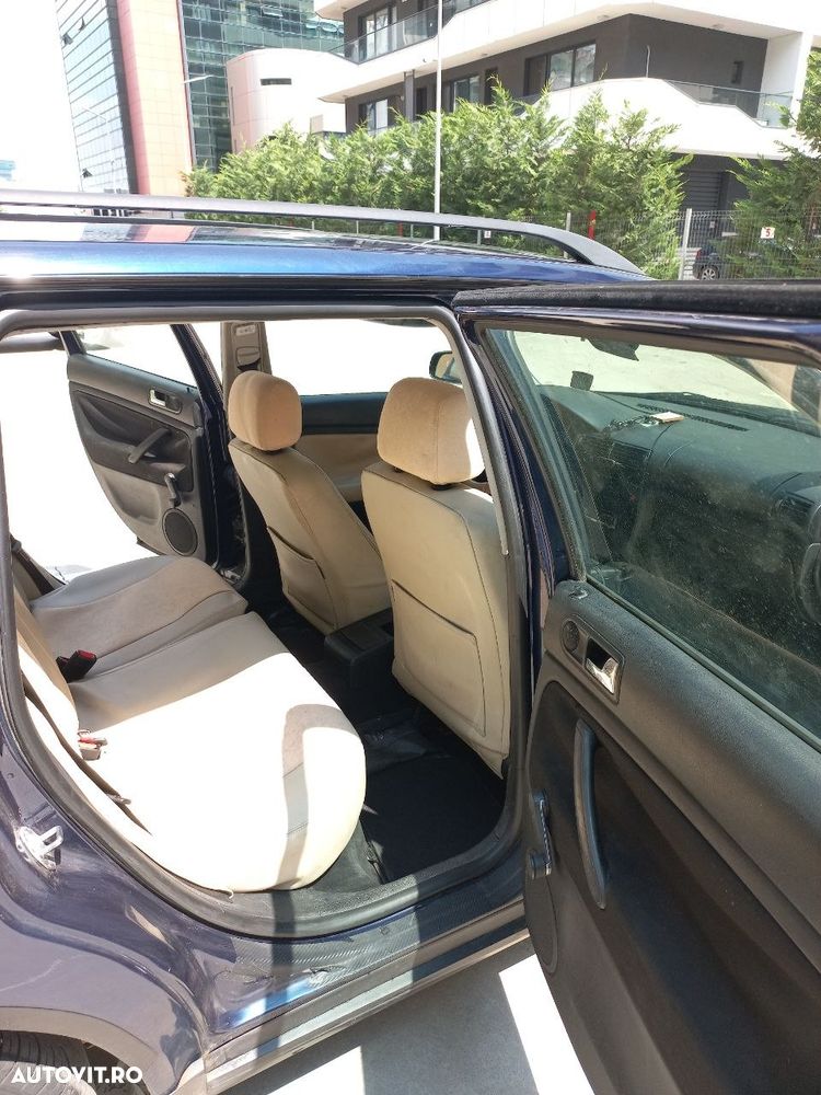 Volkswagen Passat 1.9TDI Highline - 14