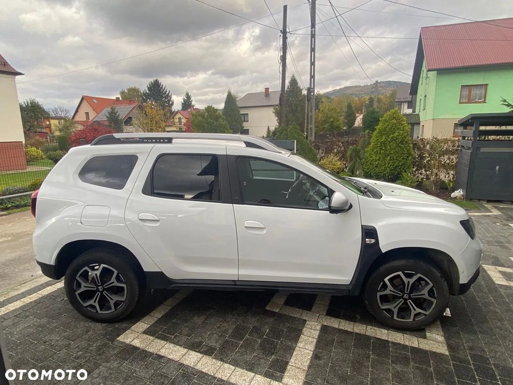 Dacia Duster 1.6 SCe Prestige 4WD - 11