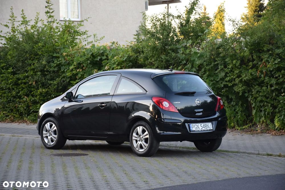Opel Corsa 1.4 16V Cosmo - 9
