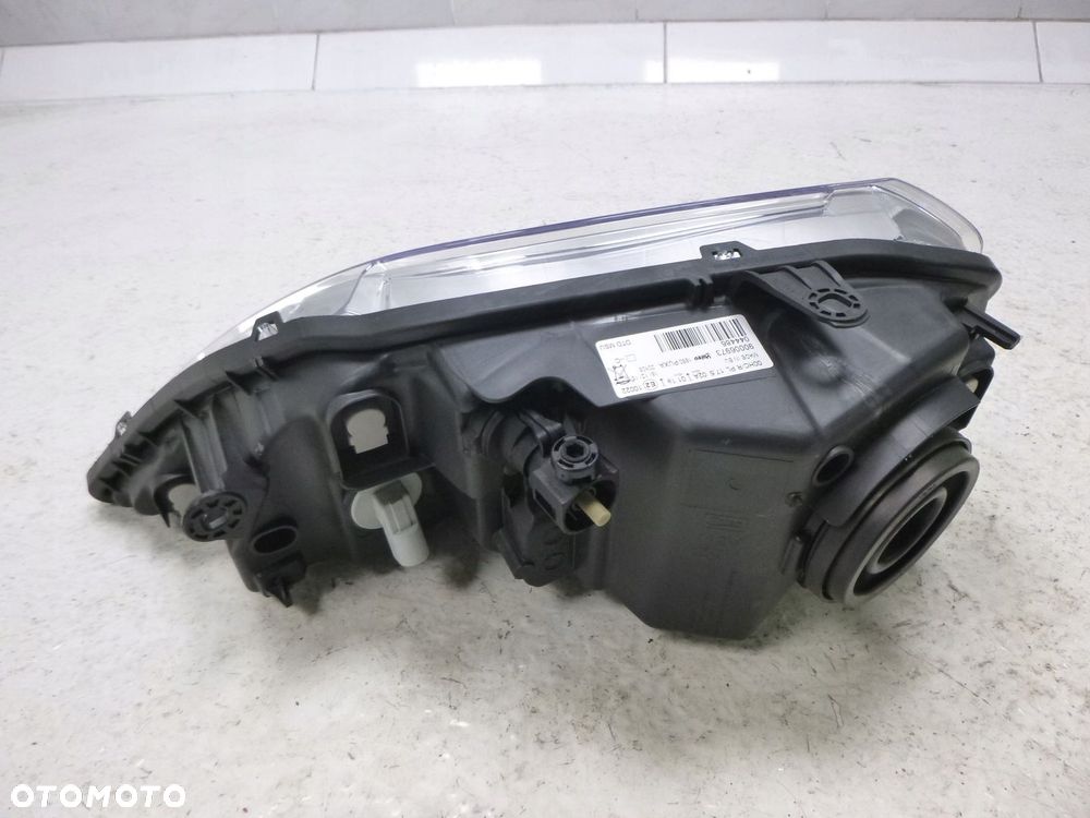 DACIA LOGAN 08-13 LAMPA PRAWY PRZÓDPRZEDNIA ORYGINAŁ - 11