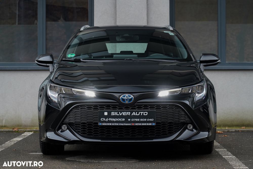 Toyota Corolla 1.8 HSD Business - 12