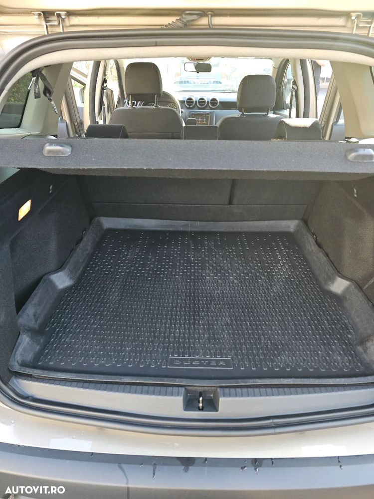 Dacia Duster 1.6 SCe 4WD Comfort - 19