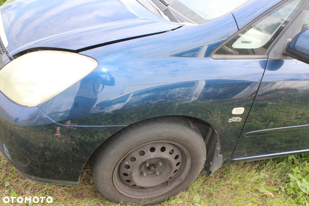 LAMPA LEWA LEWY PRZÓD COROLLA VRSO I 00-04R - 3