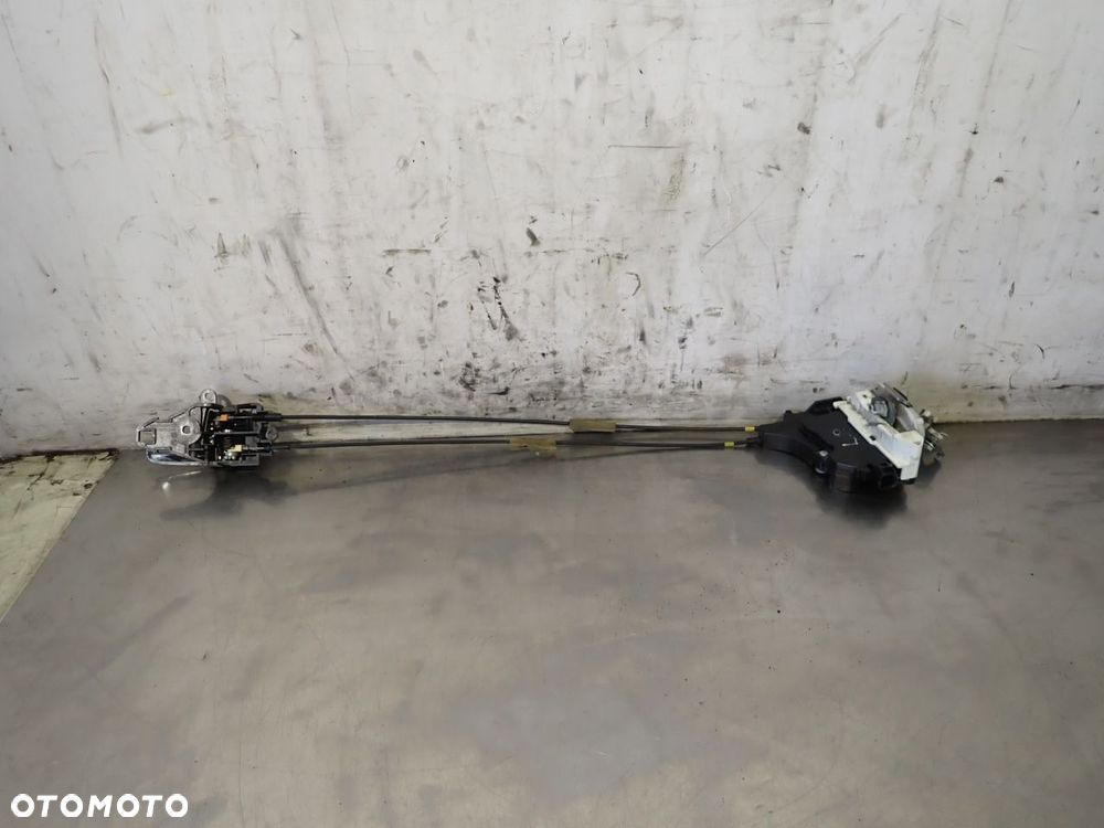 ZAMEK LEWY PRZÓD DRZWI KLAMKA MITSUBISHI LANCER VIII - 1