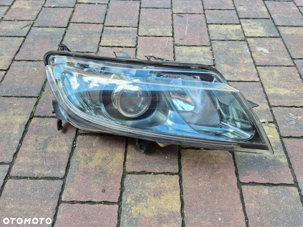 lampa xenon prawy przod saab 95 9-5 ng 10-12 anglik - 1
