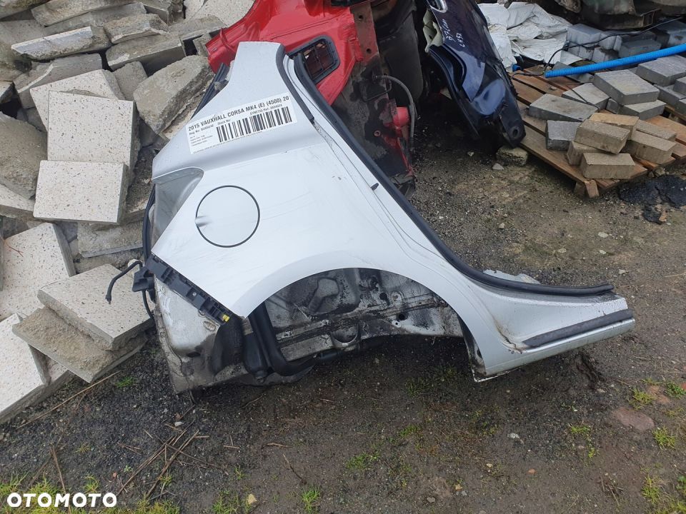 błotnik prawy tył Opel Corsa E - 1