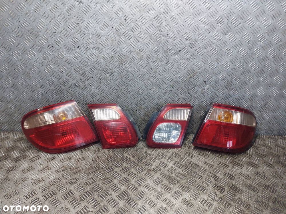 LAMPA LEWY TYŁ + PRAWY TYŁ NISSAN ALMERA N16 LIFT SEDAN - 1