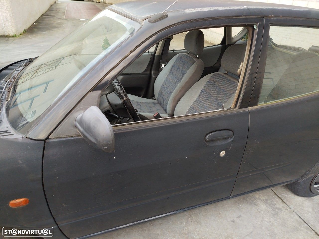 Porta frente esquerda DAIHATSU Sirion (M1) - 1