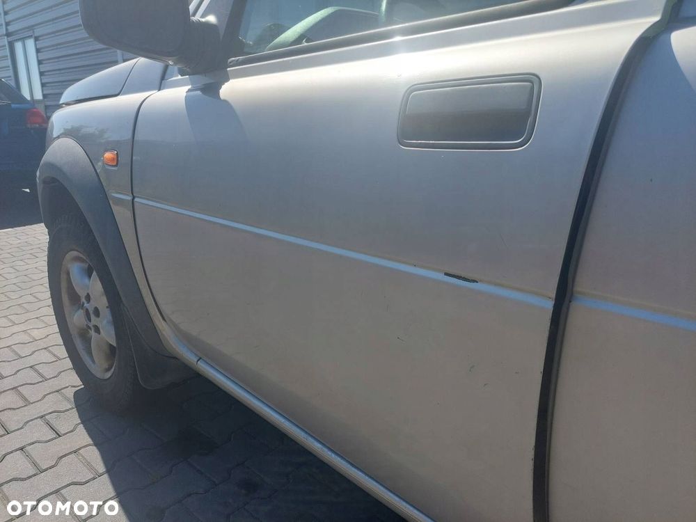 DRZWI KOMPLETNE LEWY PRZÓD LAND ROVER FREELANDER I 642 - 4