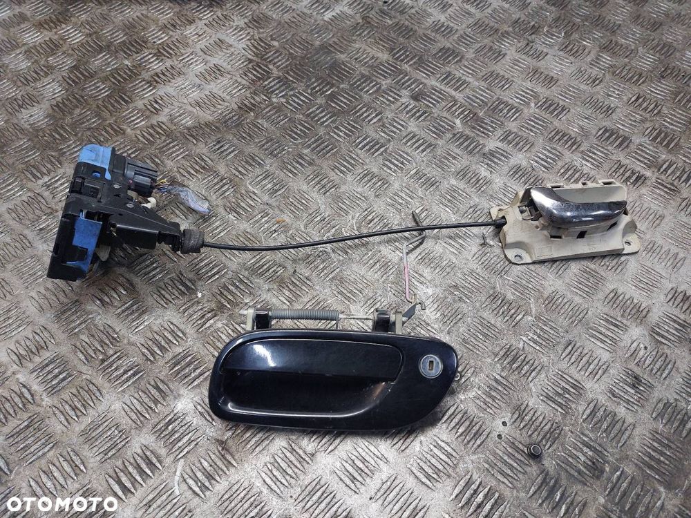 ZAMEK DRZWI LEWY PRZÓD + KLAMKA ZEWNĘTRZNA VOLVO S80 I - 1