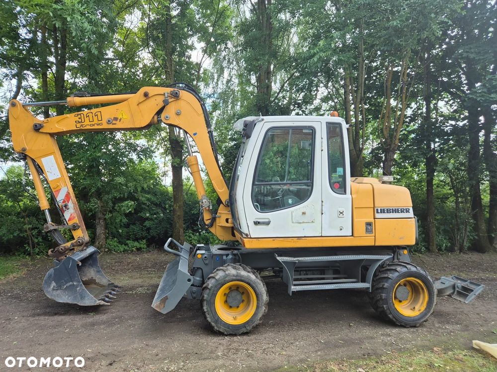 Liebherr A 311 Litronic - 2