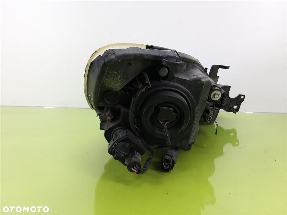 Reflektor lampa przód lewa Mitsubishi Lancer VII 2003-2011 - 5
