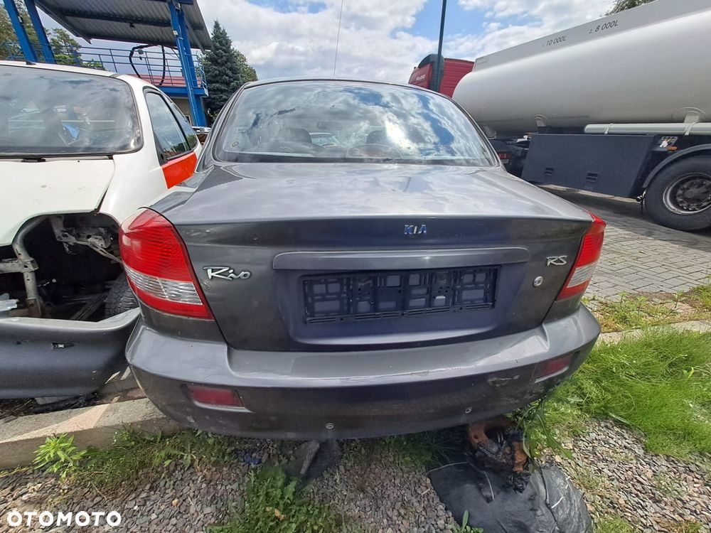 Kia Rio DC (02-05r.) 1.3 B 81 KM. Silnik AUB Skrzynia ETC lakier 1C/A5C .Cały na części.GWARANCJA !!! Przód Tył Zestaw Komplet Drzwi Klapa Zderzak Błotnik Maska Grill Atrapa Szyba Pas Lampa Lusterko Boczki Fotel Kanapa Kokpit Deska Rozdzielcza Przełącznik Włącznik Sterownik Przewody Wiązka Instalacja Moduł Komputer Czujnik Listwa Pompa Alternator Wtryski Głowica Rozrusznik Kompresor Sprzęgło Dwumas Silnik Skrzynia ABS Klimatyzacji Paliwa Wspomagania Kolektor Turbina Przepustnica Zawór Chłodnica Koło Hak Belka Sanki Zawieszenie Mcpherson Półoś Amortyzator Wydech Tłumik Zacisk Most - 3