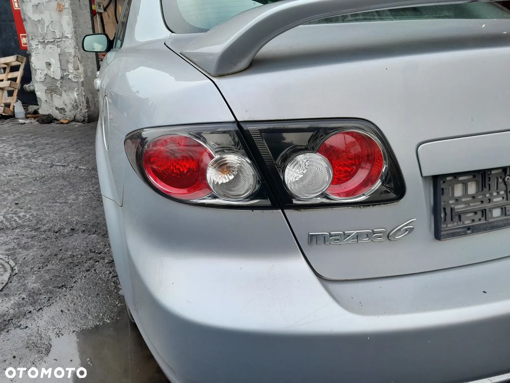 Lampa tylna lewa w klapę czarna MAZDA 6 GG 02-08r. HB Europa - 2
