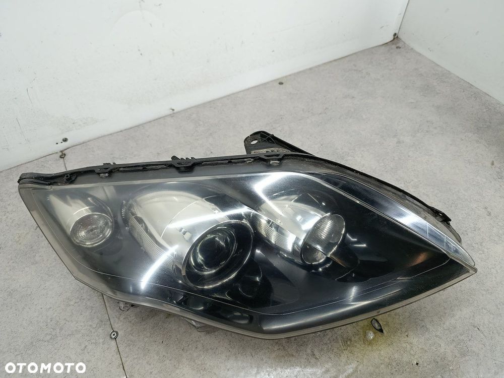 LAMPA PRZÓD PRAWA XENON RENAULT LAGUNA III 260100043R 89902279 89034934 - 1
