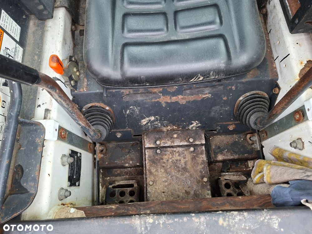 Bobcat 553 4X4 + Melroe Ingersoll-Rand 725S B/H - 14