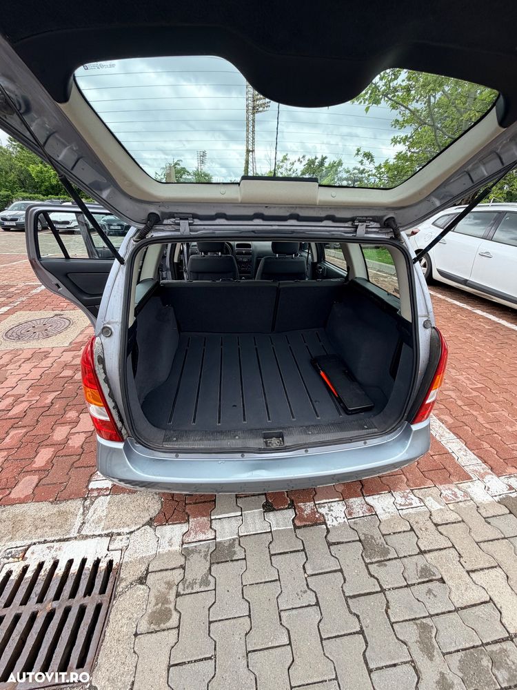 Opel Astra 1.6i Cosmo - 10