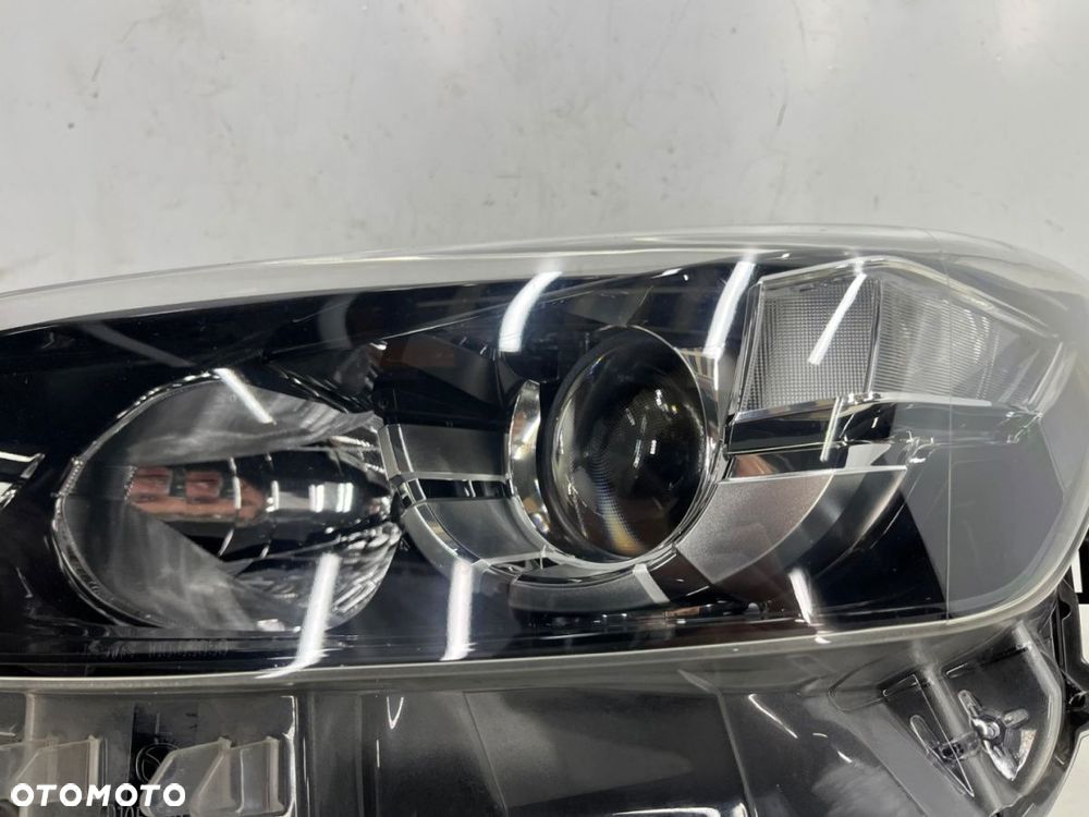 Lampa reflektor Mazda CX3 CX-3 14-21r. lewa przednia SOCZEWKA lewy przód zwykła d10e-51040 - 9