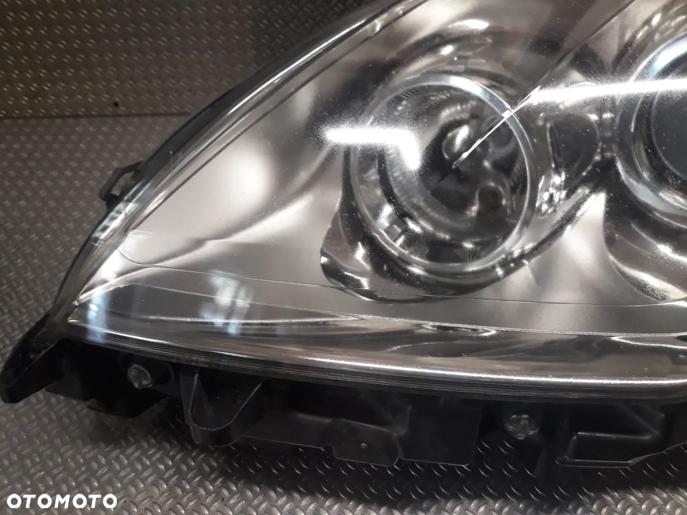 LAMPA LEWY PRZÓD RENAULT LAGUNA III SOCZEWKA  260600033R - 2