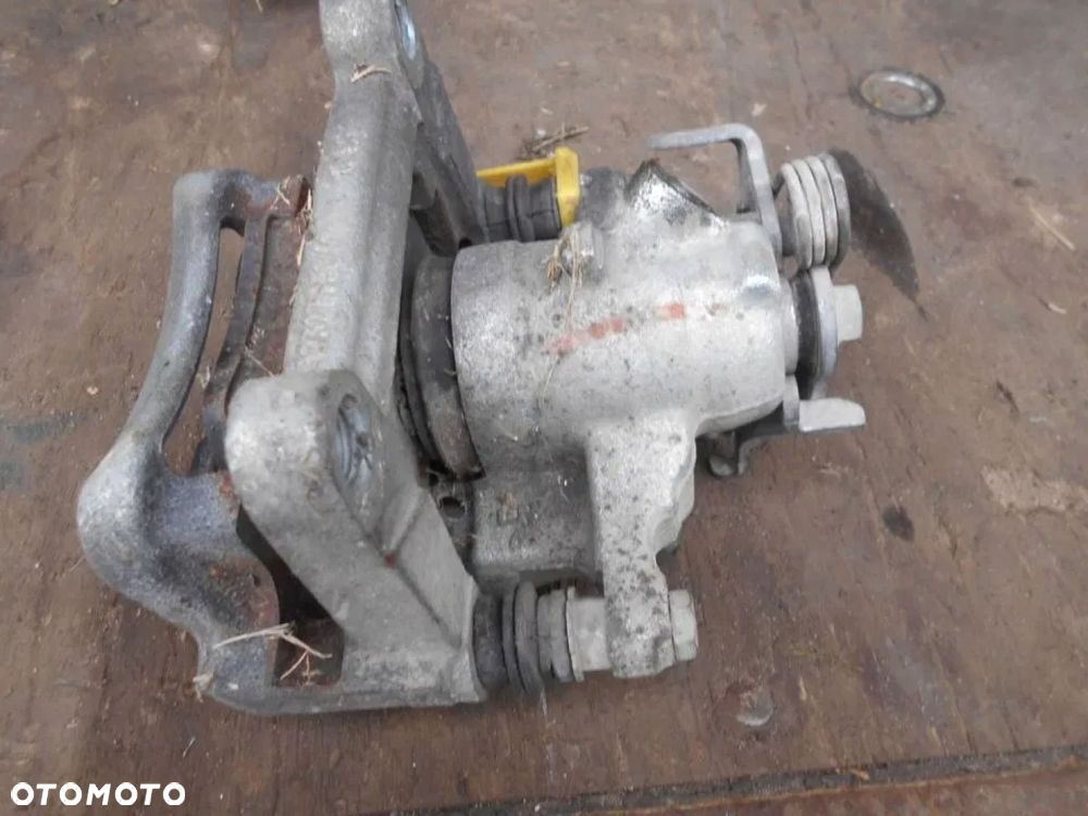 TRAFIC III VIVARO 14-19 ZACISK HAMULCOWY TYŁ LEWY - 3