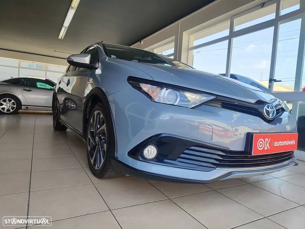 Toyota Auris Touring Sports 1.8 HSD Comfort+P.Sport - 1