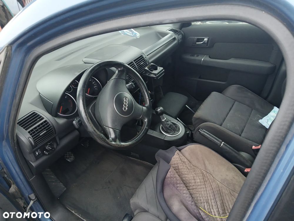 audi a2 fotel kanapa deska kokpit podsufitka boczek podłokietnik licznik panel szyb stacyjka - 2