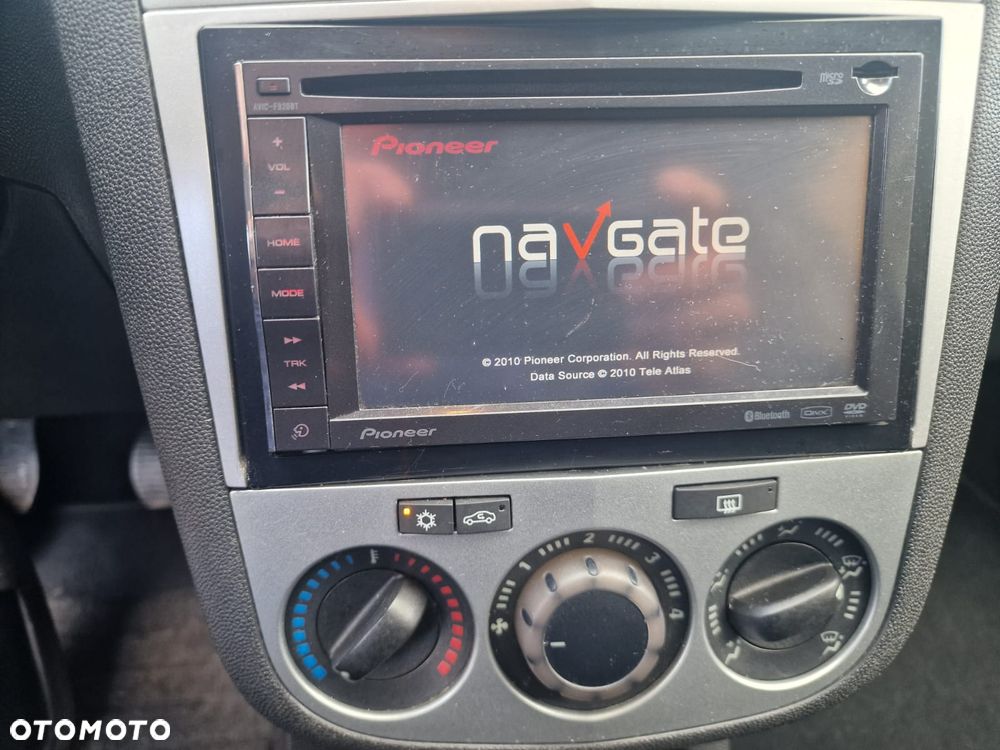 Opel Corsa 1.2 16V Enjoy - 19