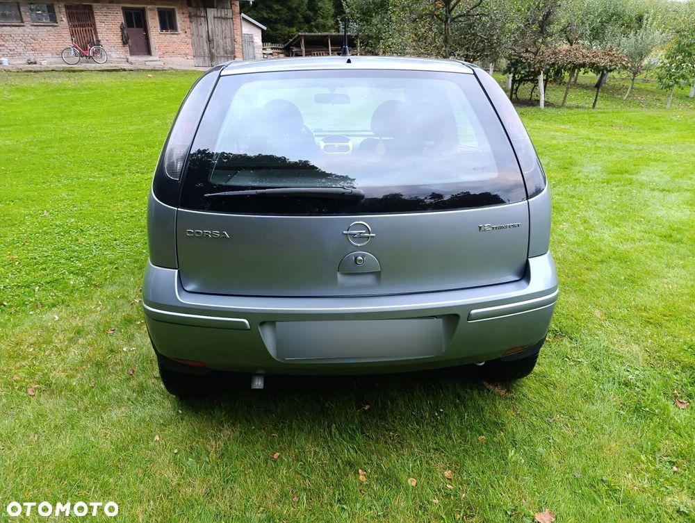 Opel Corsa 1.2 16V Cosmo - 5