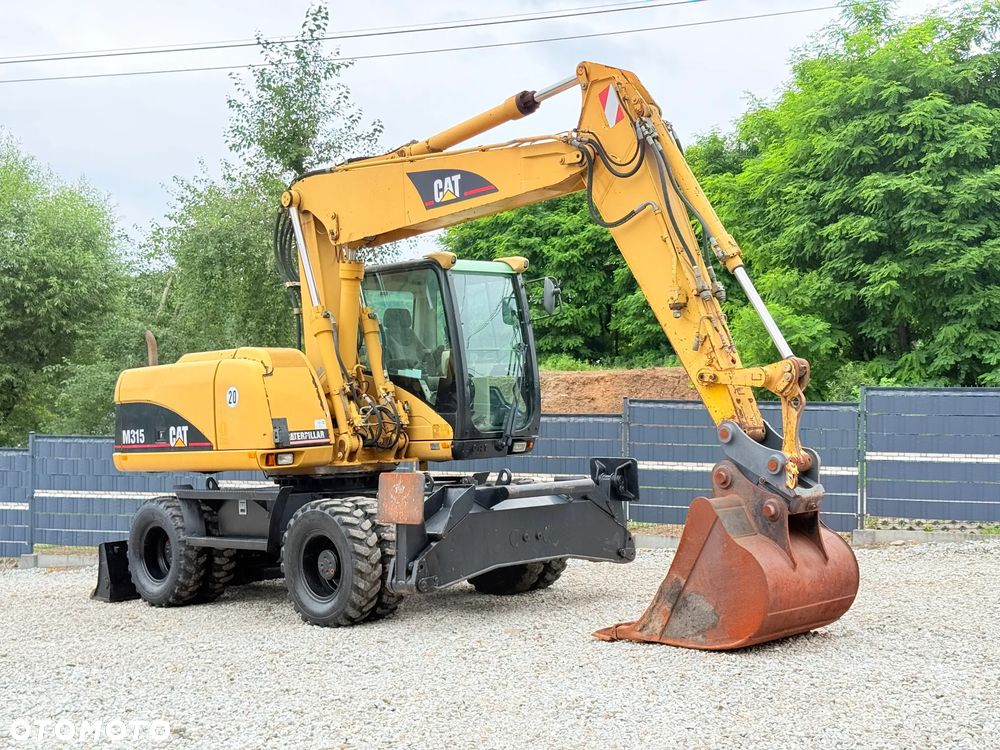 Caterpillar CAT M315C  CATERPILLAR SPROWADZONY  Bardzo Dobry Stan - 17
