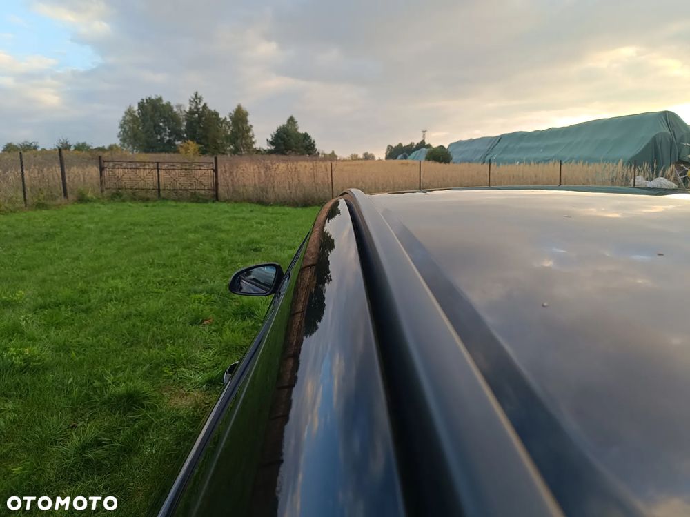 Opel Astra IV 1.4 T Cosmo - 21