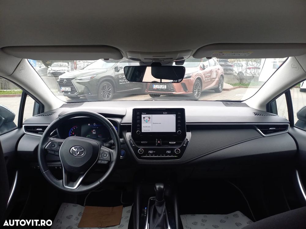 Toyota Corolla 1.8 HSD Business - 12