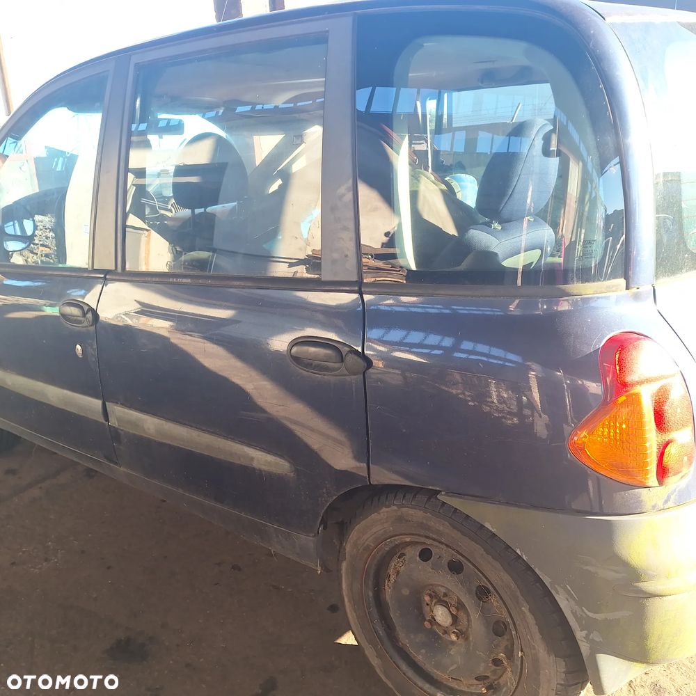 MASKA ZDERZAK DRZWI BLOTNIK LAMPY SZYBA CZESCI MULTIPLA 339/7 - 5