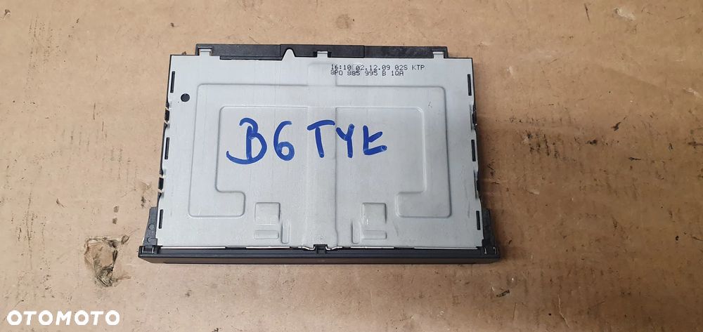 Uchwyt na kubki tył podłokietnik VW Passat B6 8P0885995B - 1