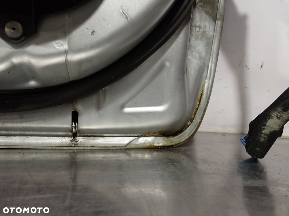 DRZWI LEWY PRZÓD TOYOTA COROLLA E15 KOL: 1F7 - 18