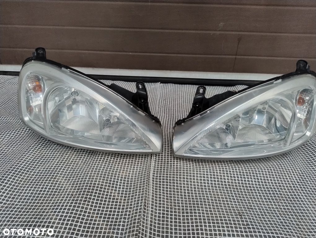 Opel Corsa c lift Europa lampa reflektor prawy lewy komplet DJ auto - 1