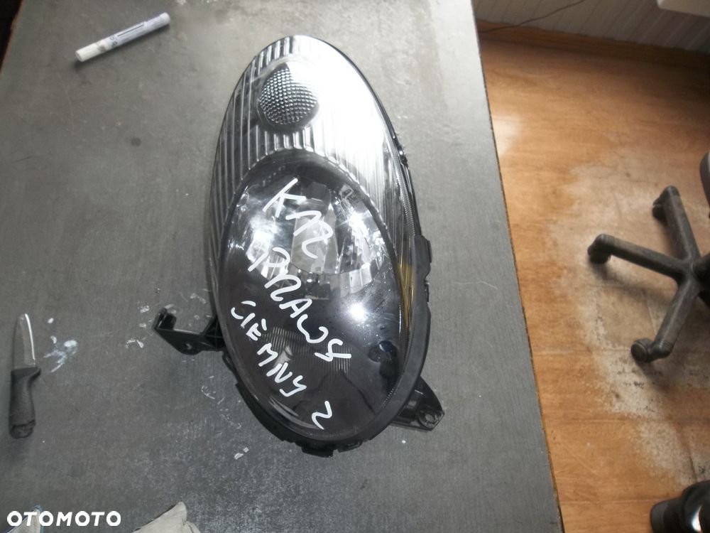 Nissan Micra K12 lampa reflektor przód lewy - 1