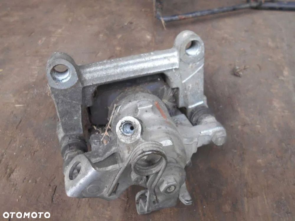 TRAFIC III VIVARO 14-19 ZACISK HAMULCOWY TYŁ PRAWY - 2