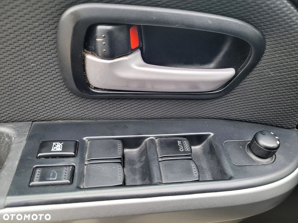 Suzuki Grand Vitara 2.0 Comfort + - 14