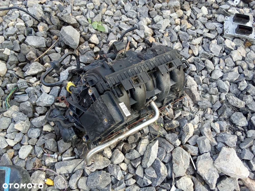 KL KOLEKTOR SSĄCY OPEL CORSA D 06- 1.4 0280600064 - 2