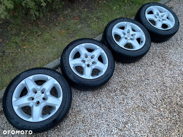 Opel Astra H Zafira Felgi strukturalne z oponami Koła 16" 5X110 6,5Jx16H2 ET39