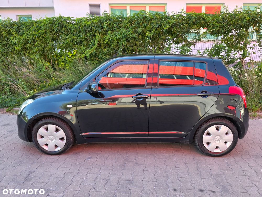 Suzuki Swift 1.3 GS / Premium - 9