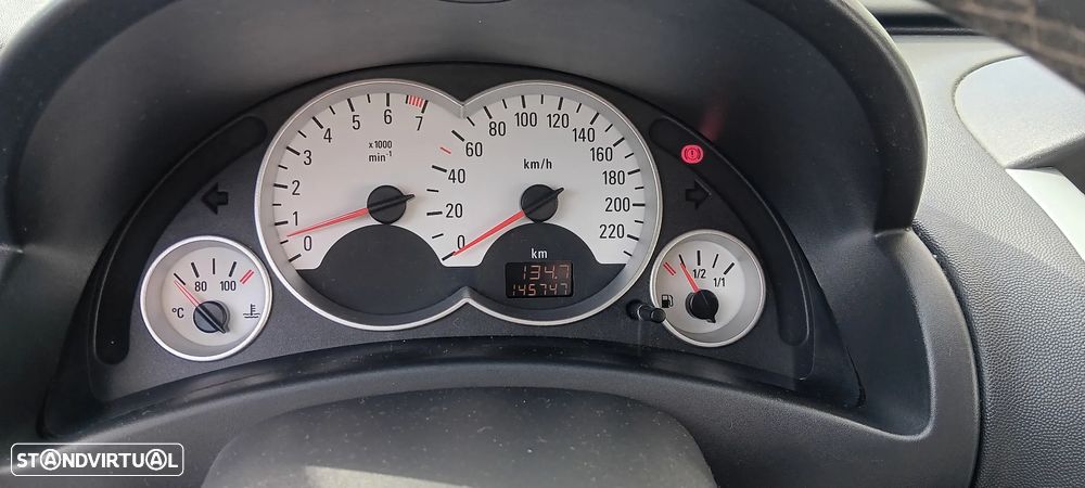 Opel Corsa 1.2 Twinport Enjoy — fotografia 11
