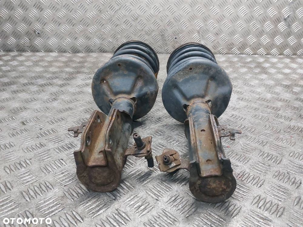 AMORTYZATOR + SPRĘŻYNA LEWY PRZÓD + PRAWY PRZÓD MAZDA 323F BA - 2