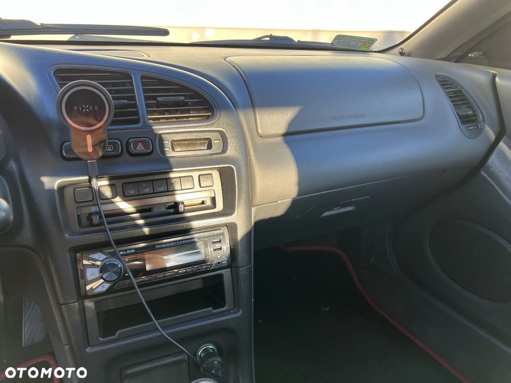 Mazda 323F 1.5 - 13