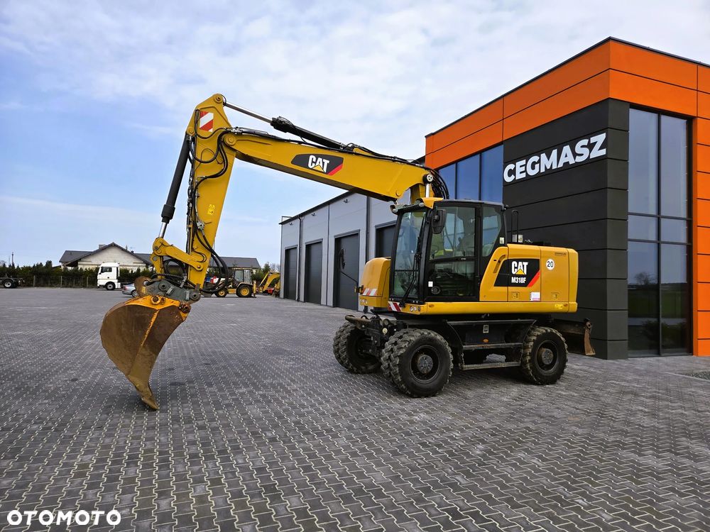 Caterpillar M 318F / z Niemiec /  9300 mth / - 1