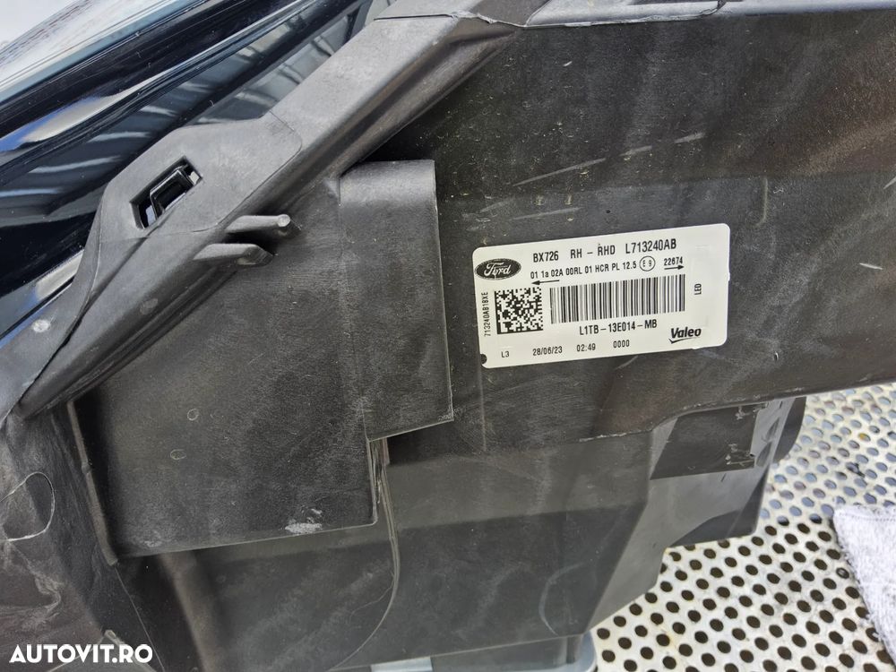 Far Led dreapta Ford Puma  cod l1tb13e014mb far led dreapta cu 1 ureche rupta mic defect - 5