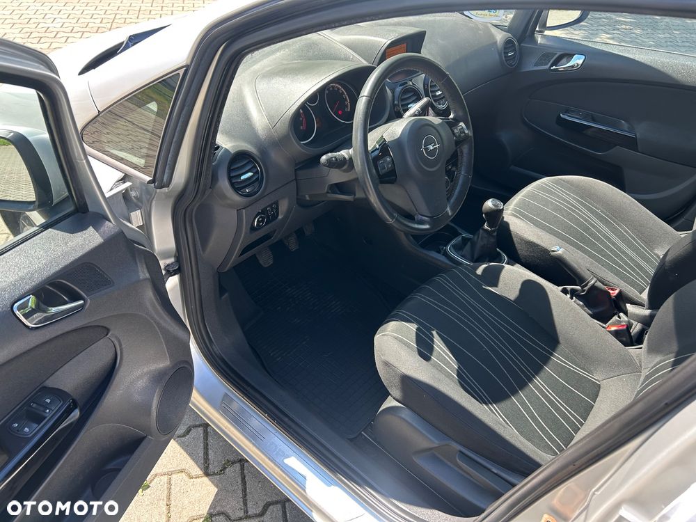 Opel Corsa 1.4 16V Enjoy - 9
