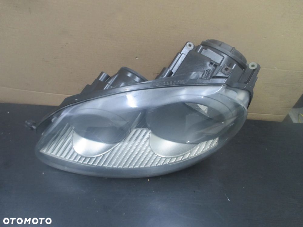 lampa lewa Golf V JETTA Hella Europa - 3