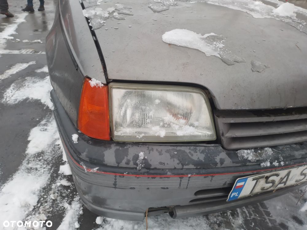 OPEL KADETT E LIFT 89-91    FELGI STALOWE KOMPLET - 8